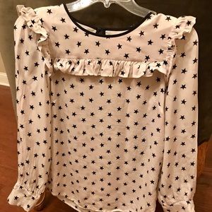 Off white ruffled long sleeve blouse w/star print